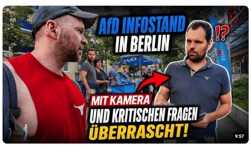 AfD Infostand in Berlin mit Kamera und Fragen überrascht.